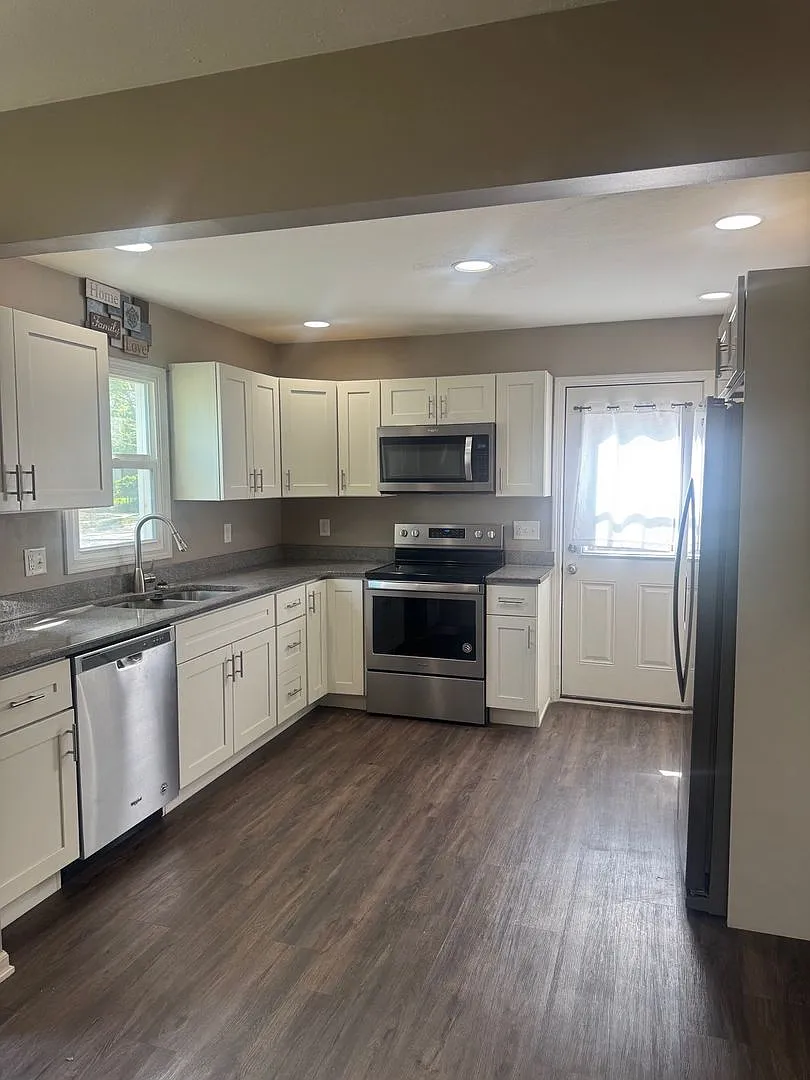 Charming Updated 3BR Home with Large Fenced Yard & Garage — Photo 3