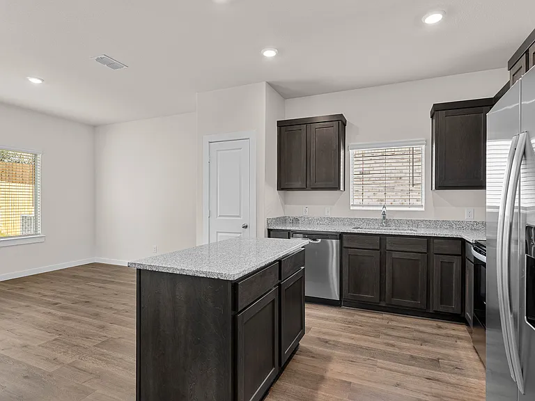 The dining room sits right off of the kitchen.