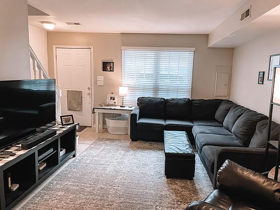 plenty of light and space in the living room which faces the driveway