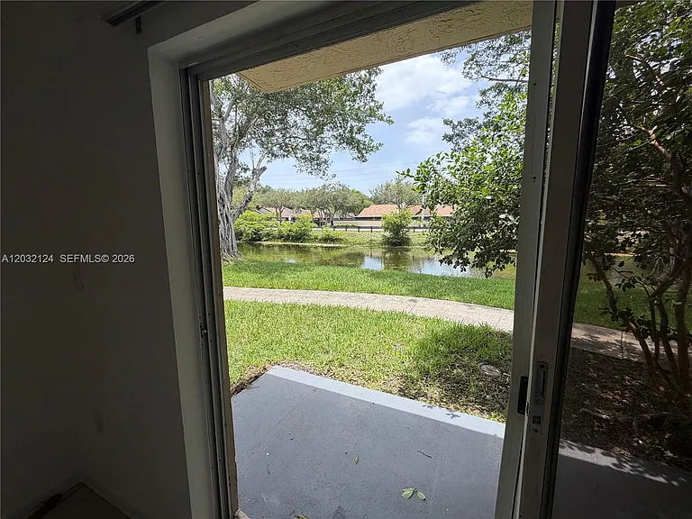1701 NW 96th Ter #1J — Photo 13