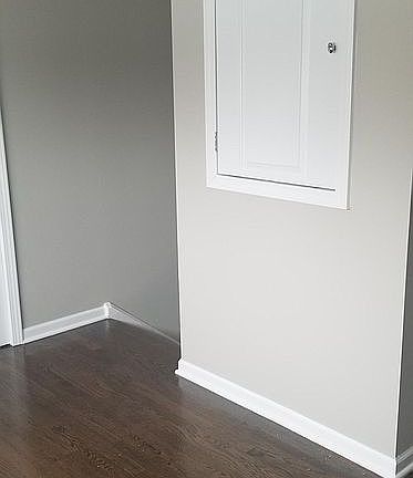 Third floor bedroom, staircase leading downstairs to the 2nd floor.