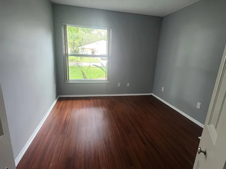 front bedroom (white wooded horizontal shades will be installed)