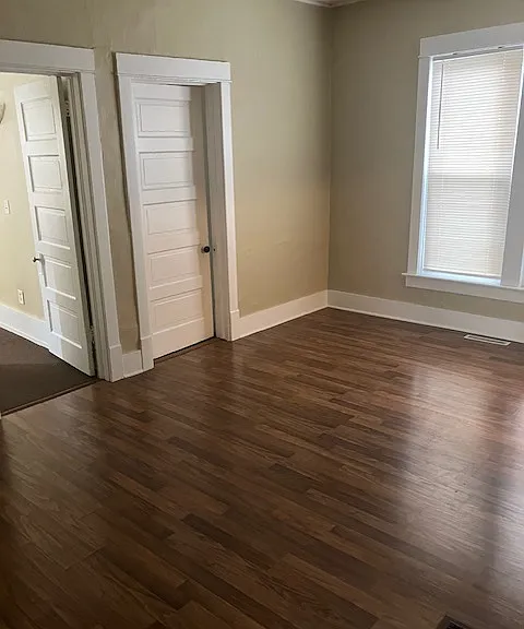 Dining room showing 2 doors to the bedrooms