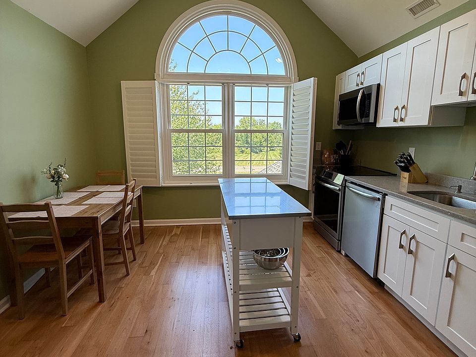 Brand new kitchen with vaulted ceiling