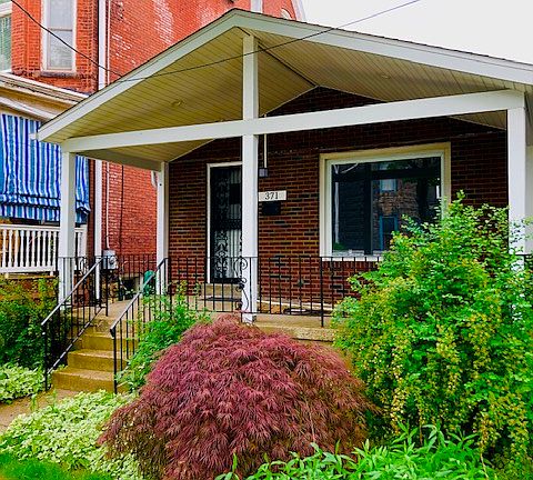 beautiful house and street in Shadyside