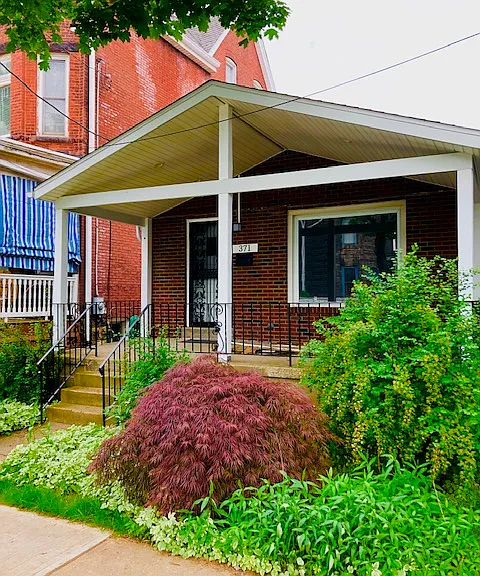 beautiful house and street in Shadyside