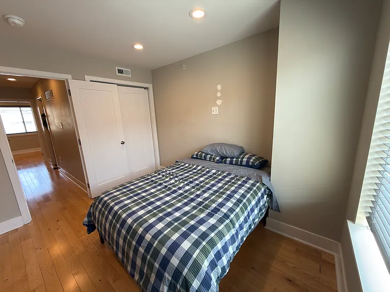 Cozy bedroom with natural light.