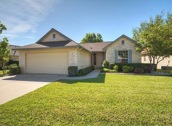 A beautiful yards welcomes you to this nice Sun City Texas Angelina, where fun Patio fencing is ready for little Fido!