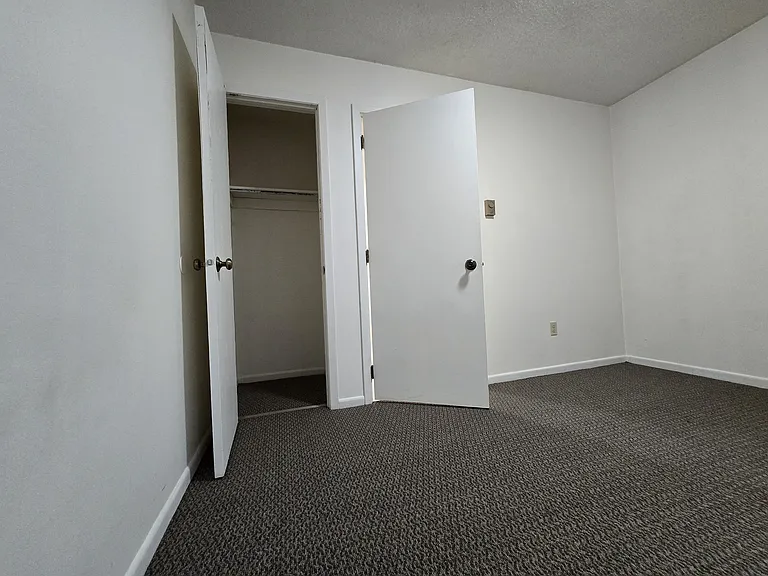 2nd bedroom closet behind bedroom door