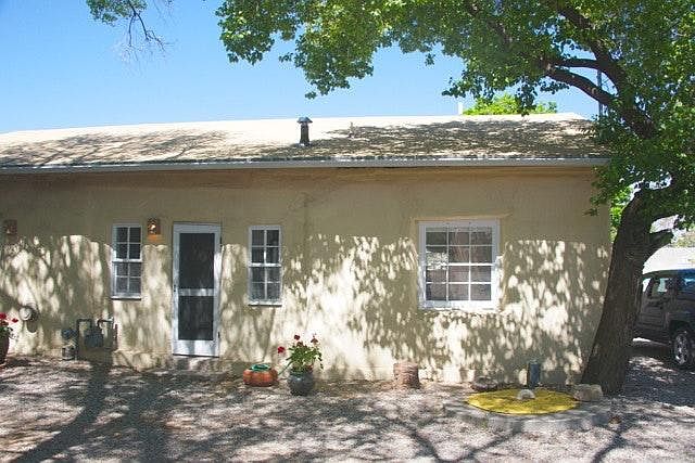 Front of duplex apartment in historic adobe building
