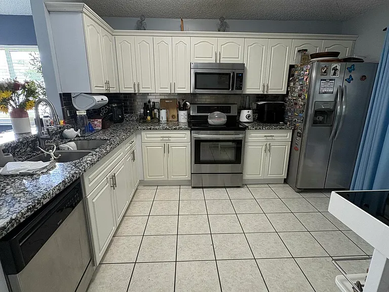 702 NW 208th Ter — Photo 7