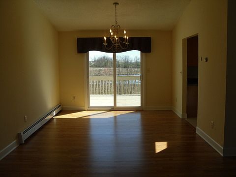 Formal Dining Room w sliders to deck is open to Family Room