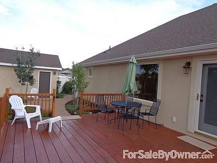 Rear of Home
						:
						Photo of deck and storage unit