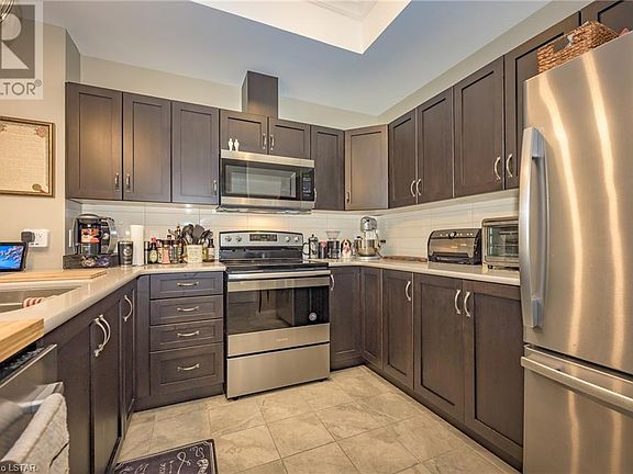 Stainless Steel Appliances. Granite Countertops.