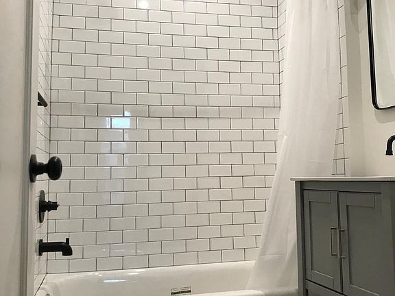 Remodeled bathroom. New shower and matte black fixtures.