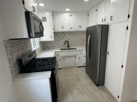 7277 W Manchester Ave