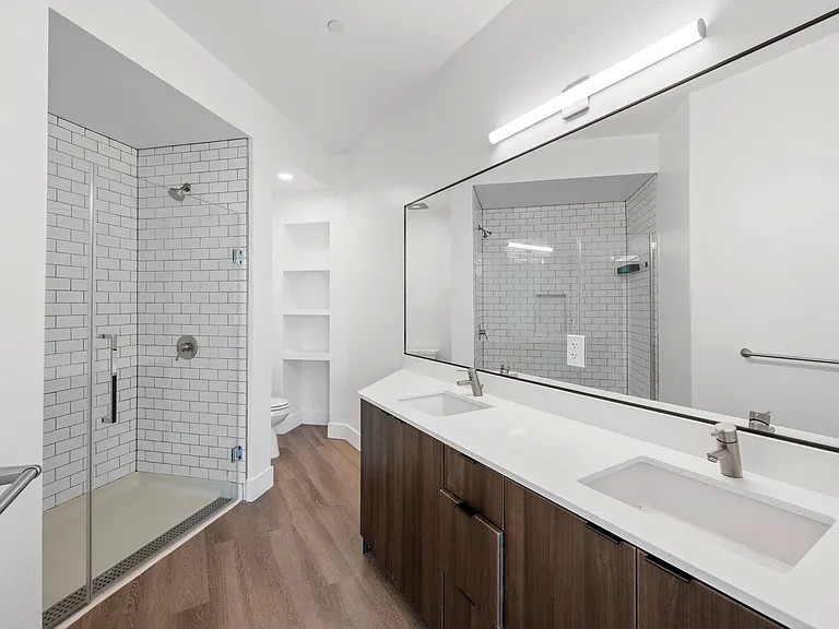 Refresh and unwind in a spa-inspired bathroom featuring a sleek walk-in shower
