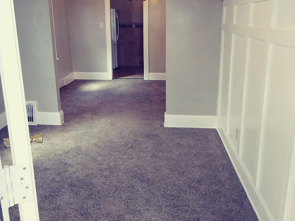 Tiled Entrance way welcomes you to a comfortable living room