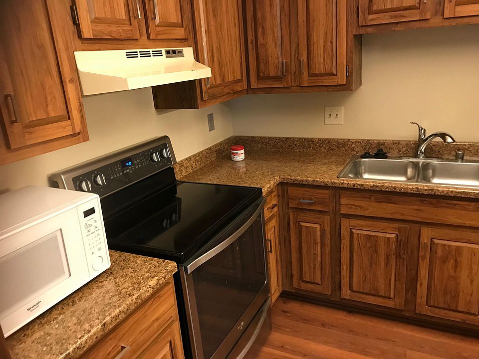 Gourmet Kitchen with New Countertops and ALL Stainless Steel appliances including Refrigerator, Stove, Dishwasher, Garbage Disposal, and Microwave!!
