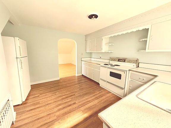 Large vintage eat-in kitchen with ample counter space