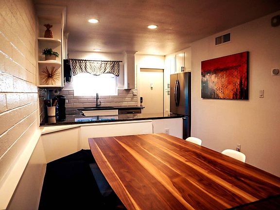 4th image of 6936 E 4th St APT 4