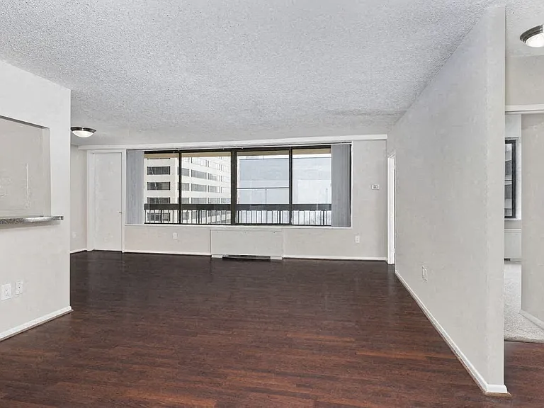Living Room With Expansive Window at Crystal Square, Virginia