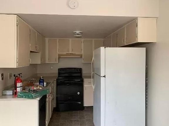 Kitchen with Light Pink painted cabinets