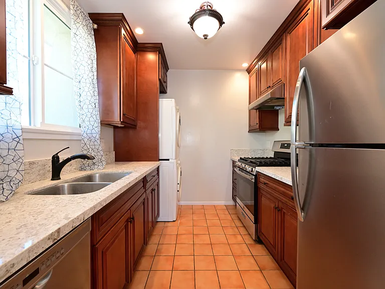 fully upgraded and bright w/ parquet hardwood flooring + mini split hvac + in-unit laundry