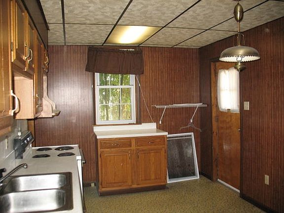 Kitchen with stove & frig