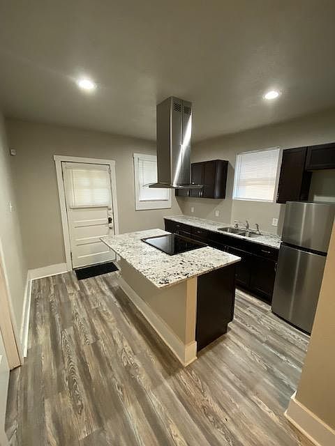 Brand new kitchen with granite and stainless appliances