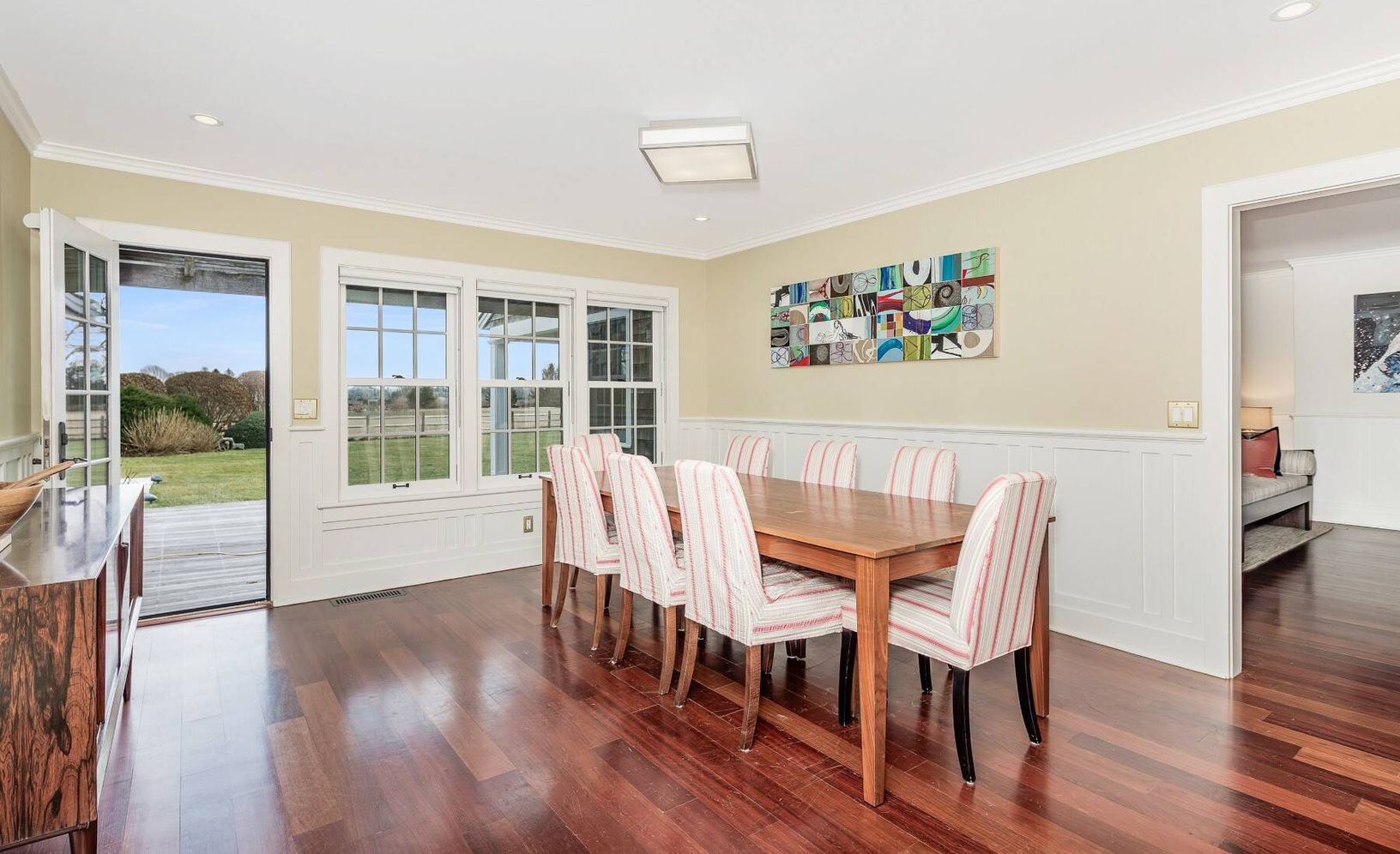 Adjacent Dining Opening to Deck and Lawn