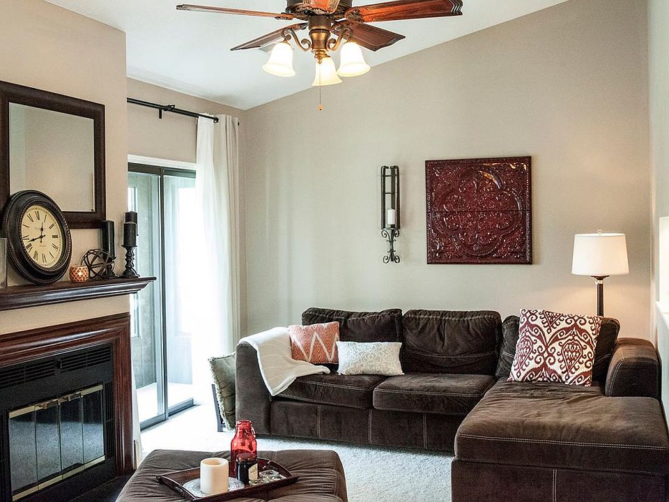 Spacious Living Room with Vaulted Ceilings and Large Windows let in natural light