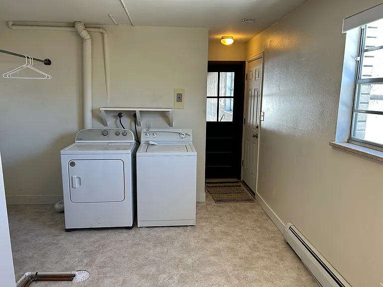 Full size washer and dryer and rod to easily hang clothes