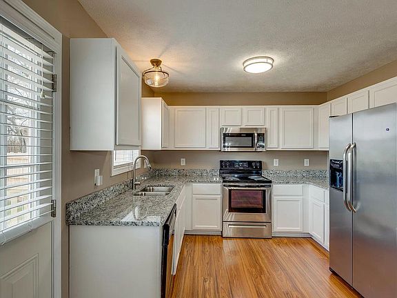 Updated kitchen with granite countertops