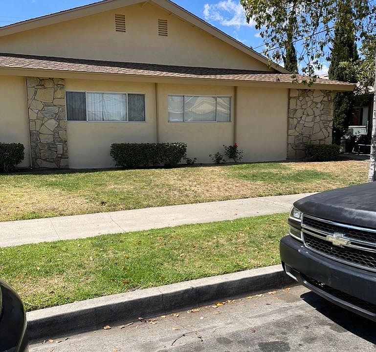 Exterior just painted and new lawn is being installed.