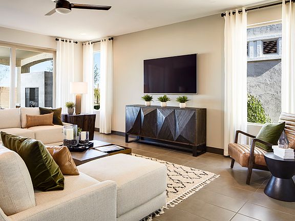 Spacious gathering room with bright windows