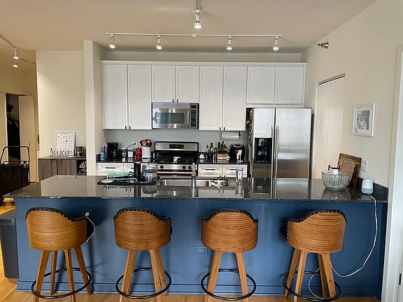The kitchen appliances are upgraded to new Samsung white colored theme.