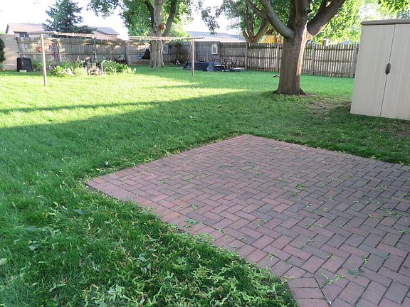 PATIO/SEMI-PRIVATE BACK YARD AND STORAGE UNIT