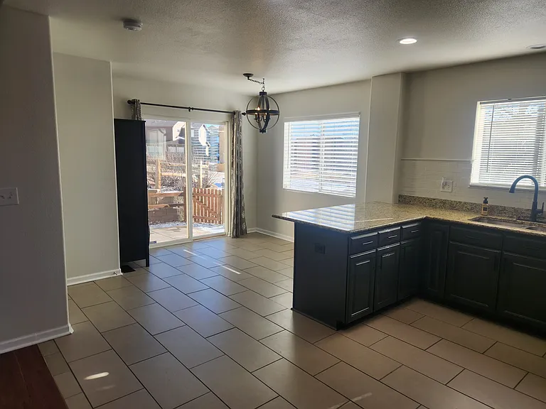 Dining Area with pation, yard and playground access