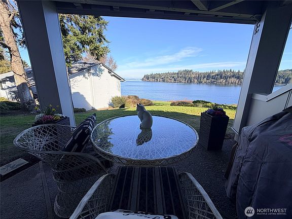 Sit outside on your patio enjoy the water views and mountain views.>