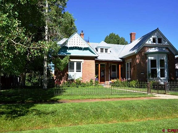 Manicured lawn and Gunnison irrigation ditch