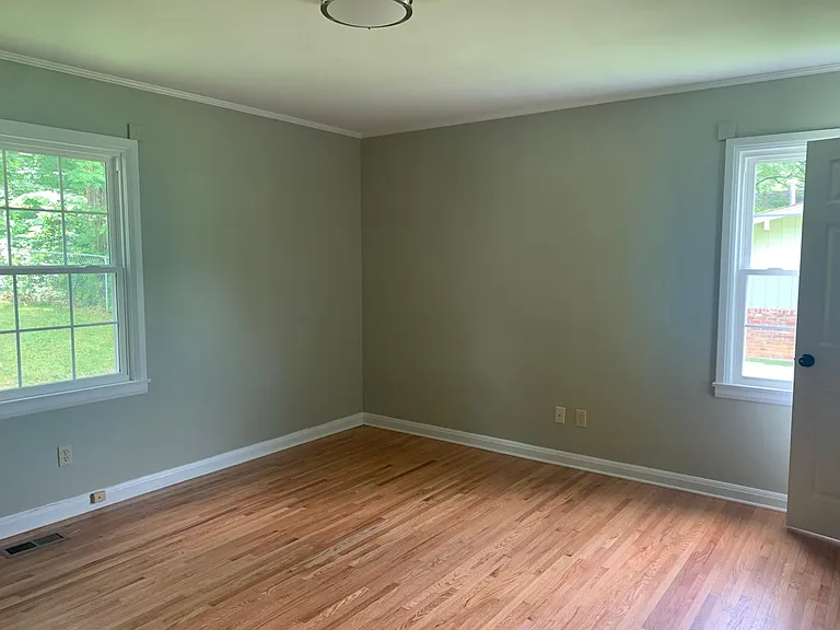 Largest of 3 bedrooms on this end of house.