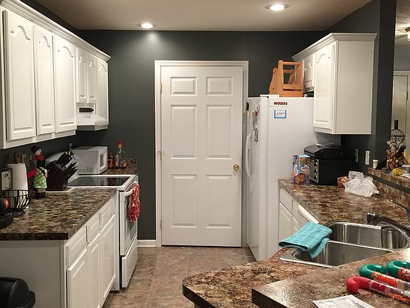 Kitchen with laundry room