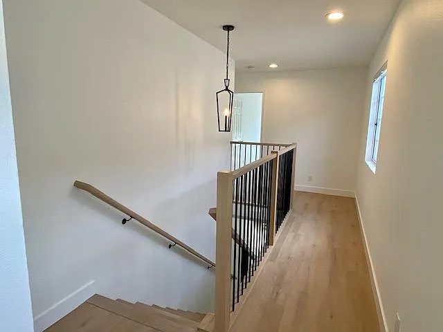 Upstairs hall with all new lighting.
