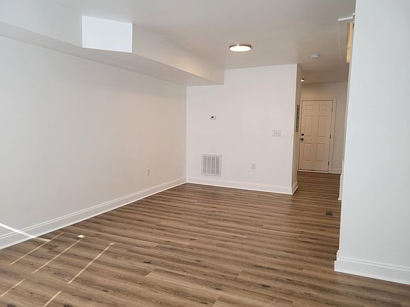 standing at front door, enter from sidewalk