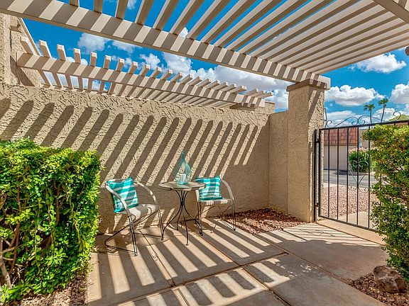 GATED FRON COURTYARD W/ PERGOLA