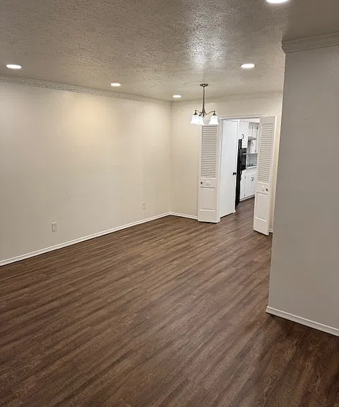 Family area looking at dining area into kitchen