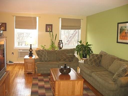 Spacious Living Room with Gleaming Hardwood Floors