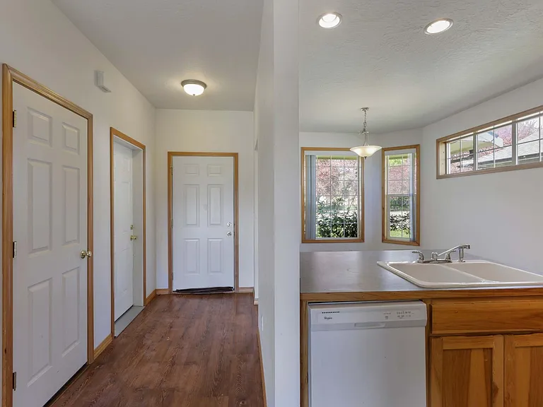 Kitchen with entryway and hall closet