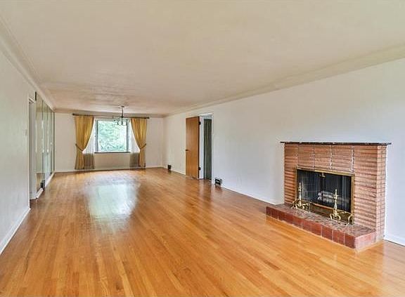 The spacious living room opens to the dining room - great open space